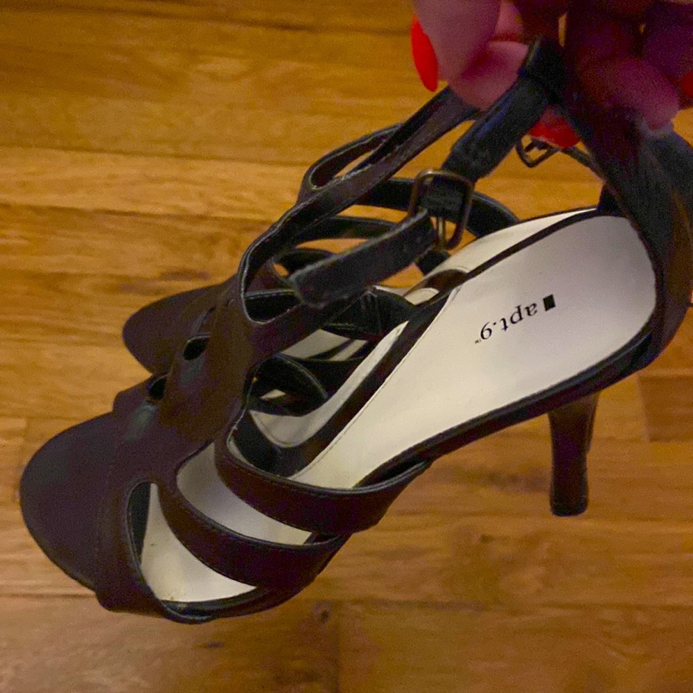 Brown high heel sandal.